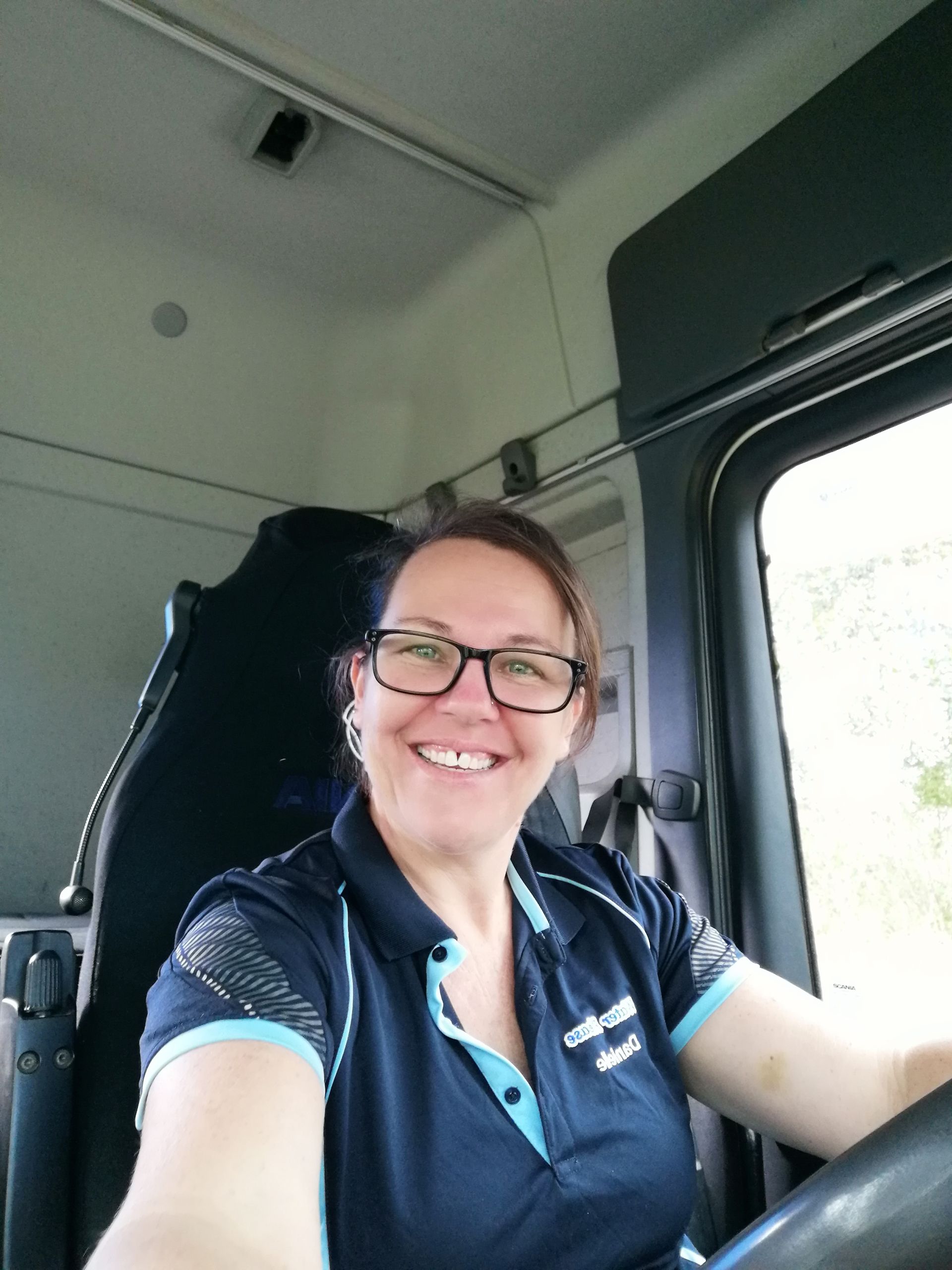 Lady from water please smiling in a truck — Water Please In Alstonville, NSW