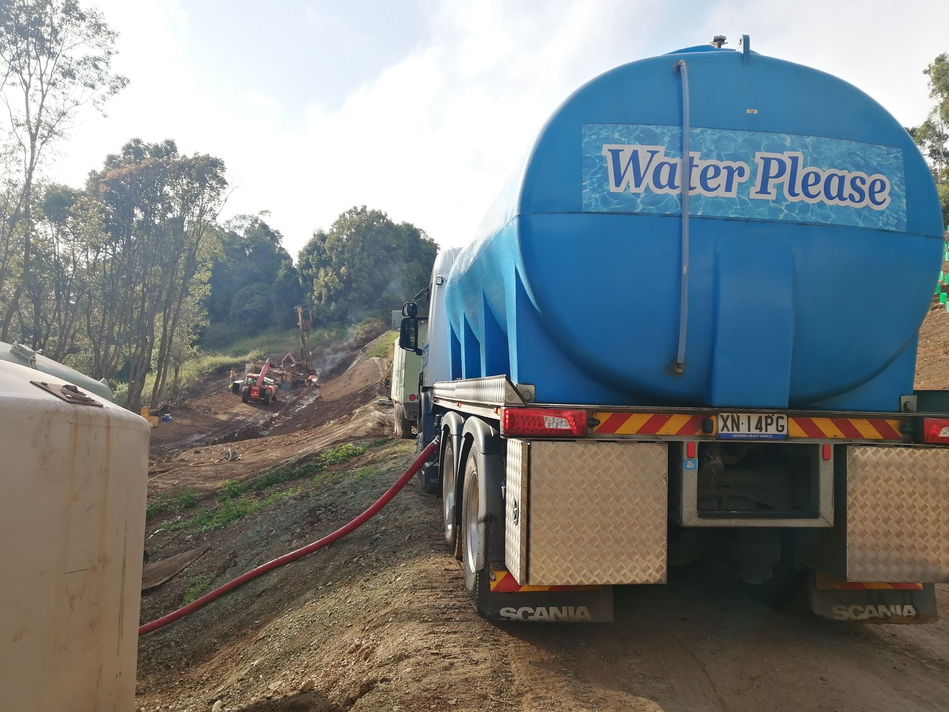 A Blue and White Truck Is Parked on The Side of The Road — Water Please In Ballina, NSW