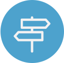 A blue circular icon featuring a white line drawing of a signpost pointing in opposite directions.