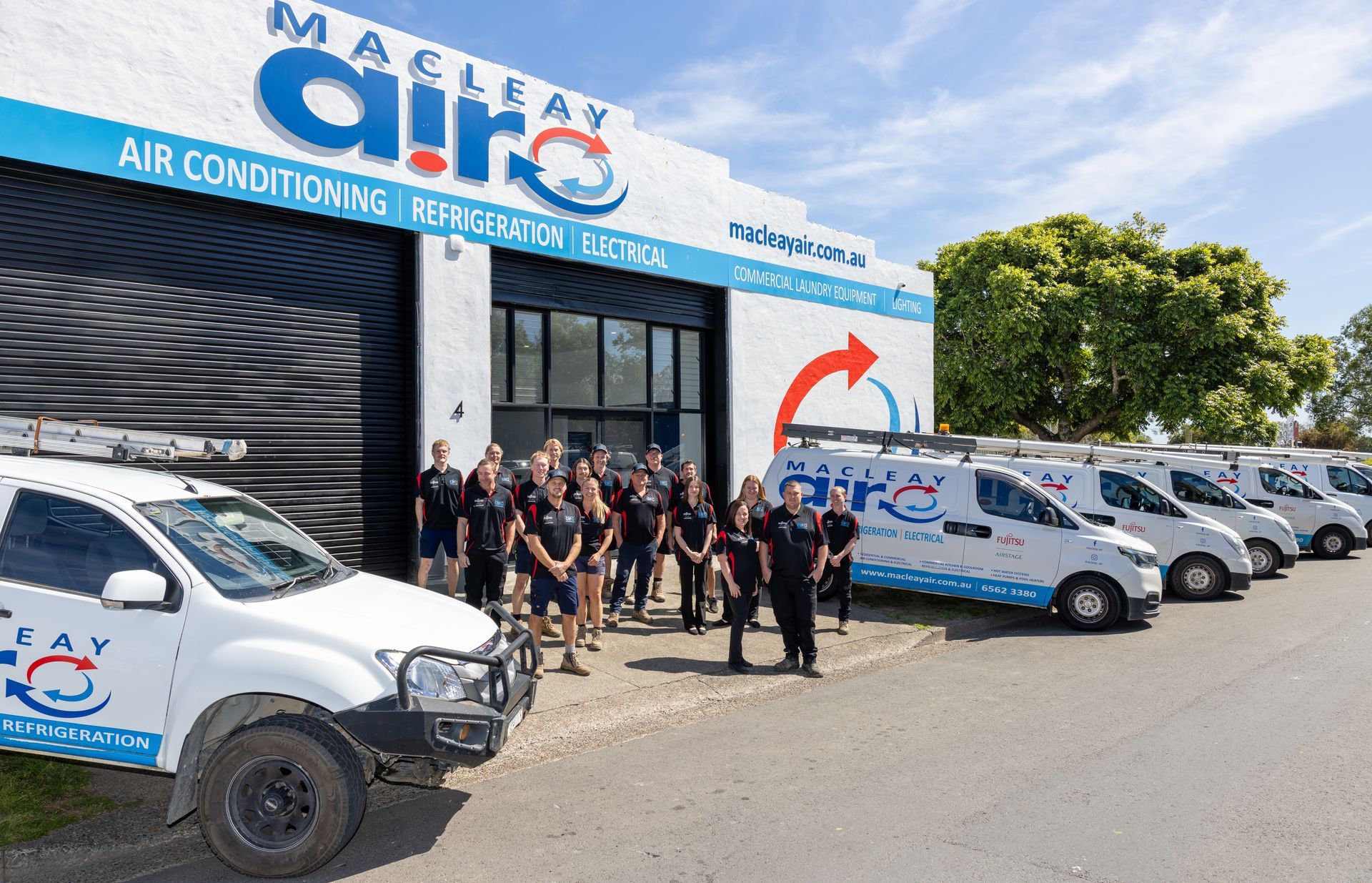 An Empty Room With Shelves And Fans On The Ceiling — Macleay Air In West Kempsey NSW