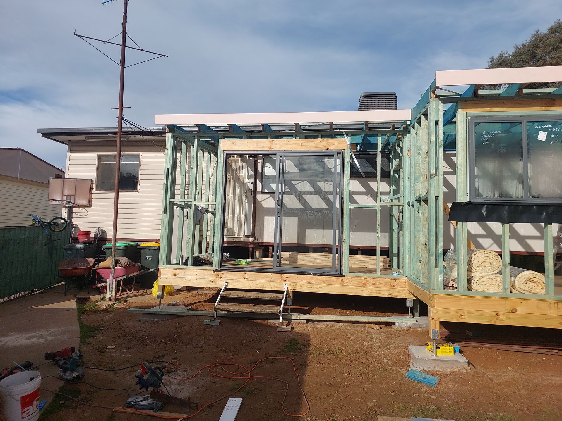 Framing of a House Extension; Wooden Structure, Steps, and Door Frame Are Visible — Elimar Construction in Goulburn, NSW