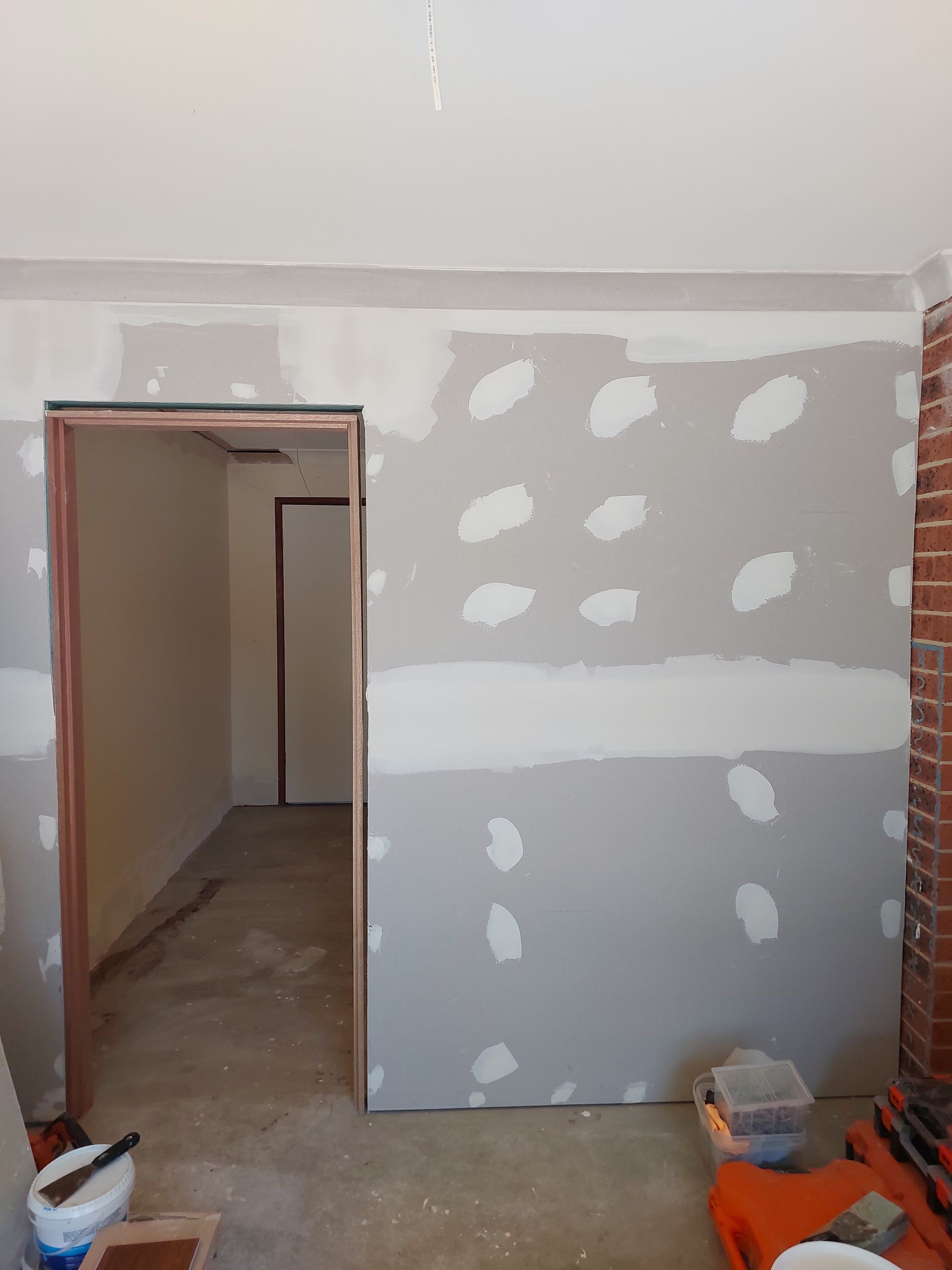 Room Under Construction With Drywall Installed. Interior View, Unfinished Walls, Exposed Studs, and Door Frames Visible — Elimar Construction in Goulburn, NSW