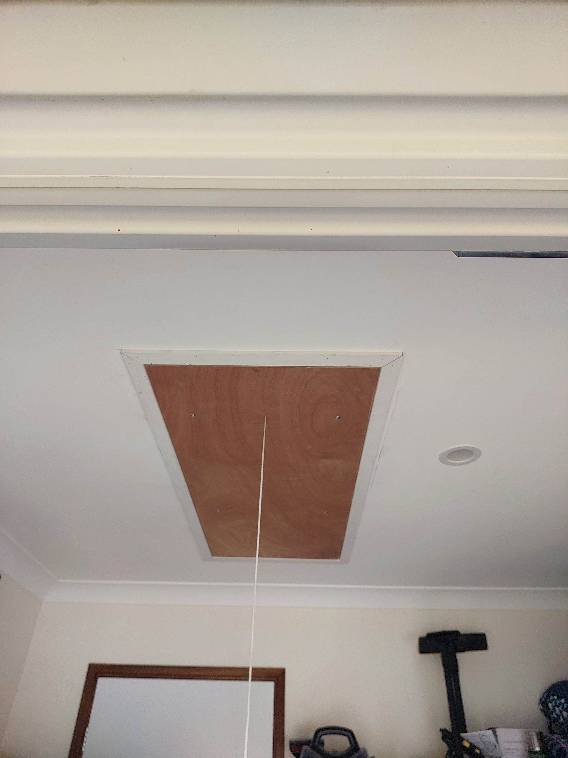Ceiling Access Panel With a Wooden Door, a White String Hanging Down — Elimar Construction in Goulburn, NSW