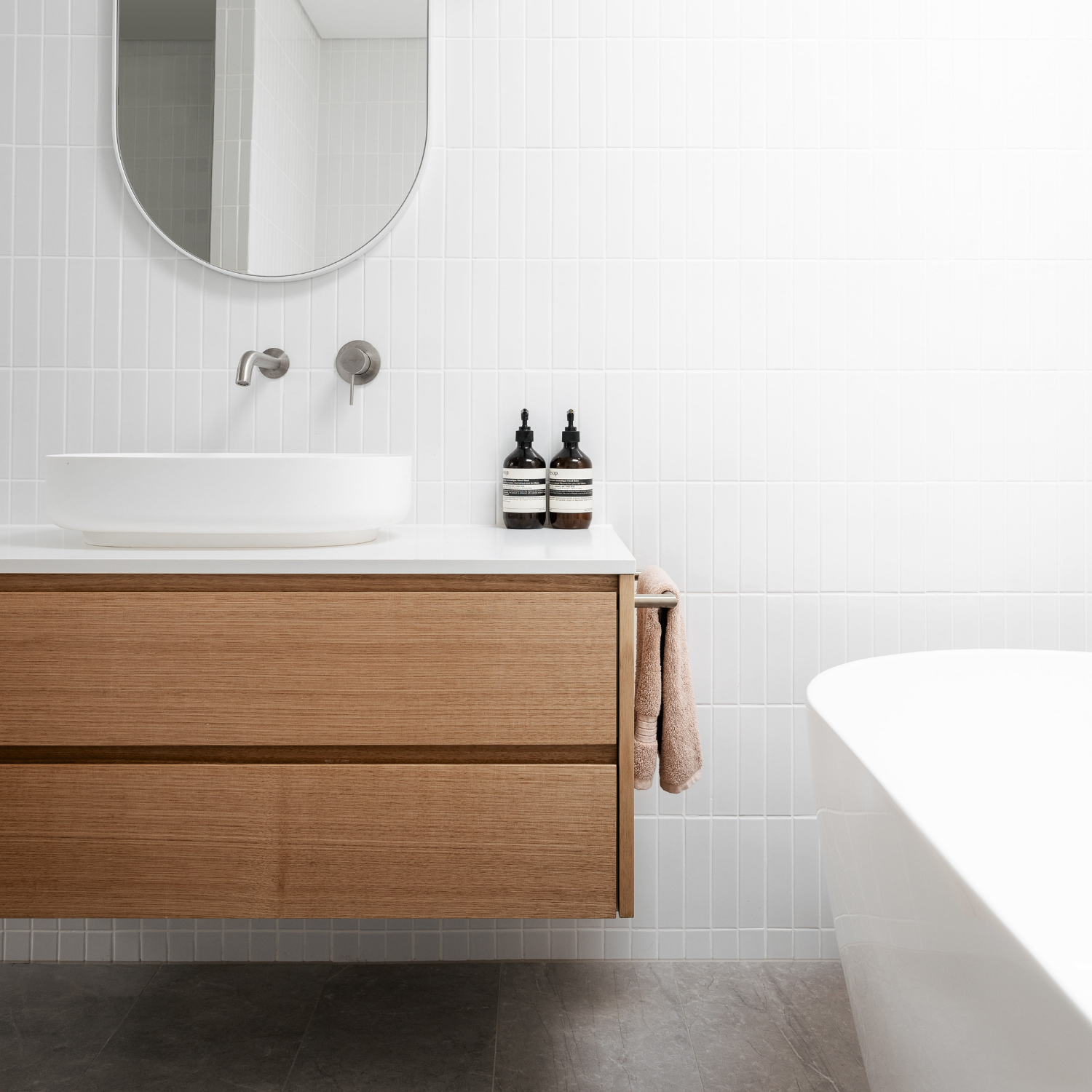 Modern Bathroom With Wood Vanity White Sink — Elimar Construction in Braidwood, NSW