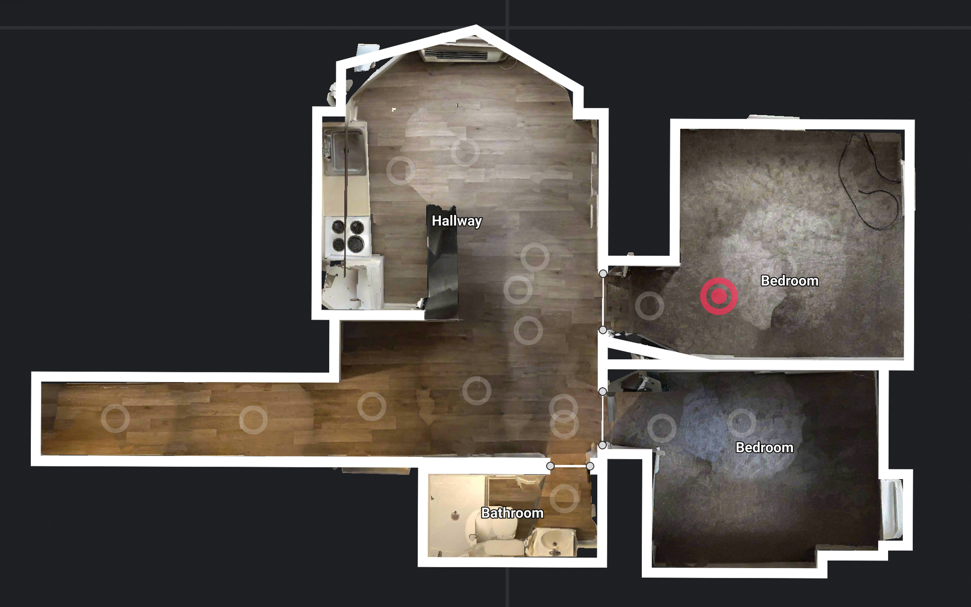 Floor plan of a house with living room, kitchen, two bedrooms, and a bathroom.