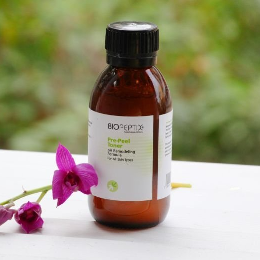 A brown bottle with a white label that says biopeptos