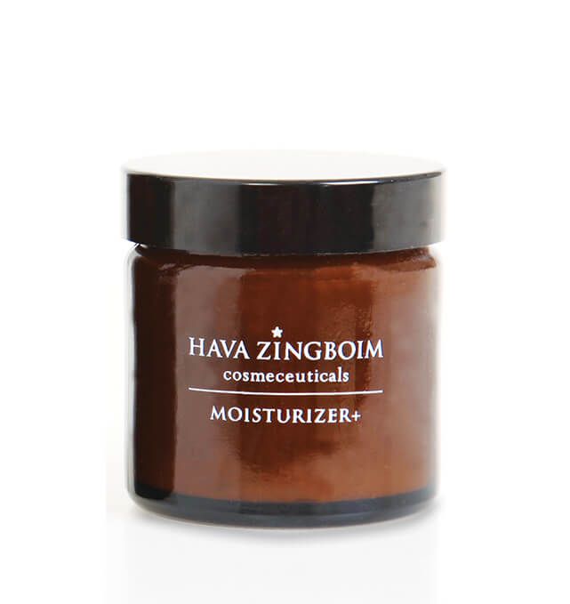A jar of hava zingboim moisturizer on a white background