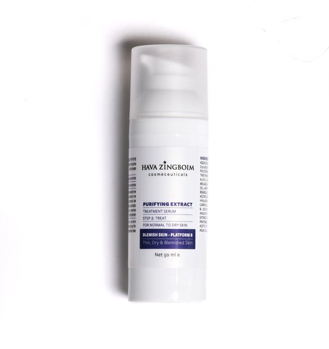 A white bottle with a blue label that says high jincaolin