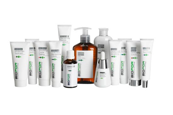 A bunch of bottles and tubes of skincare products