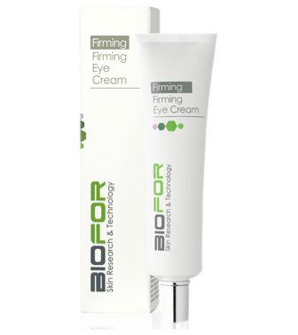 A tube of firming eye cream next to a box.