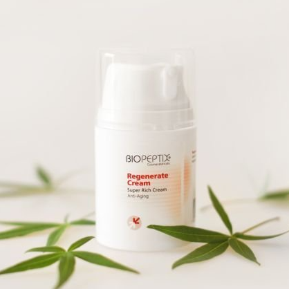 A white bottle of biopeptix regenerate cream
