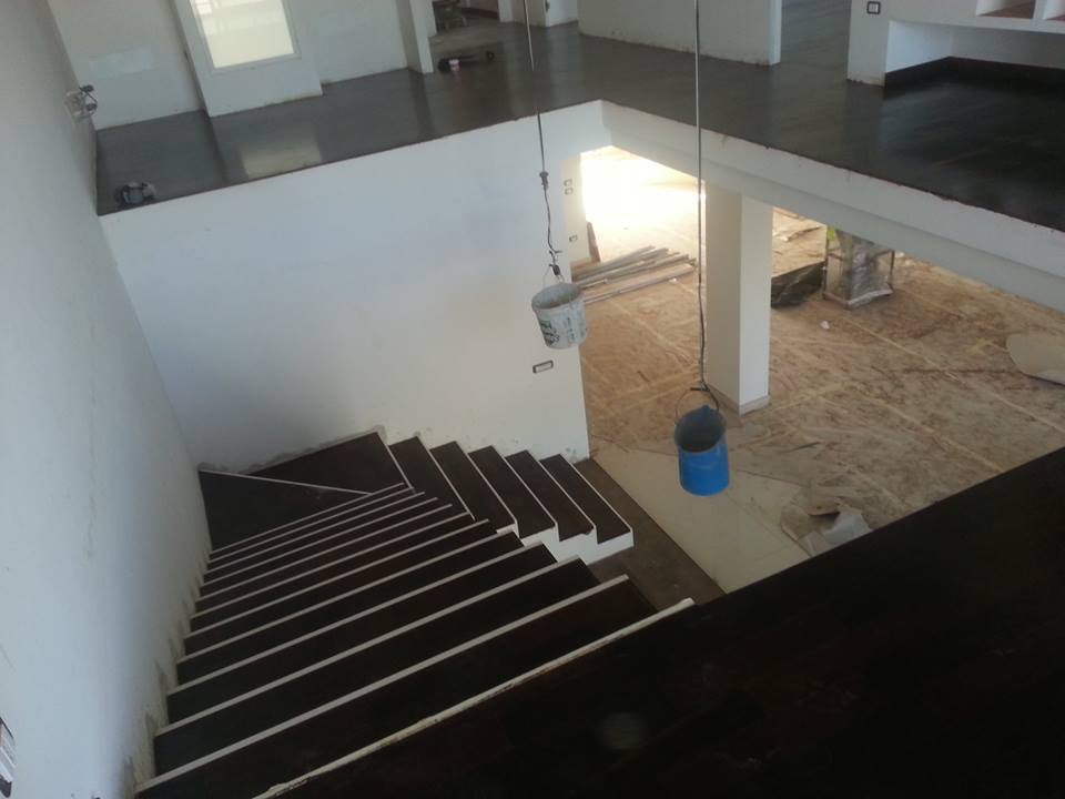 scala in legno effetto a tappeto