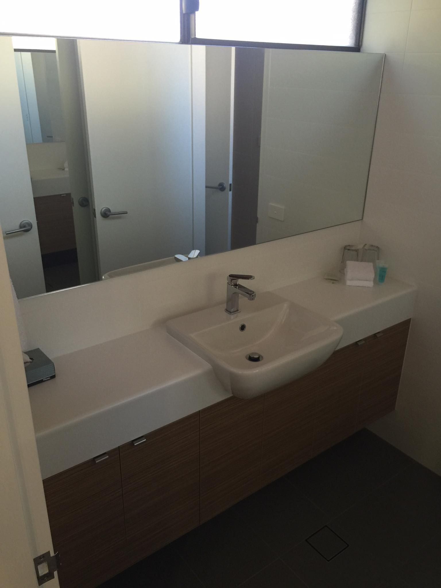 Bathroom With a Floating Vanity — Platinum Kitchens & Bathrooms in Sawtell, NSW