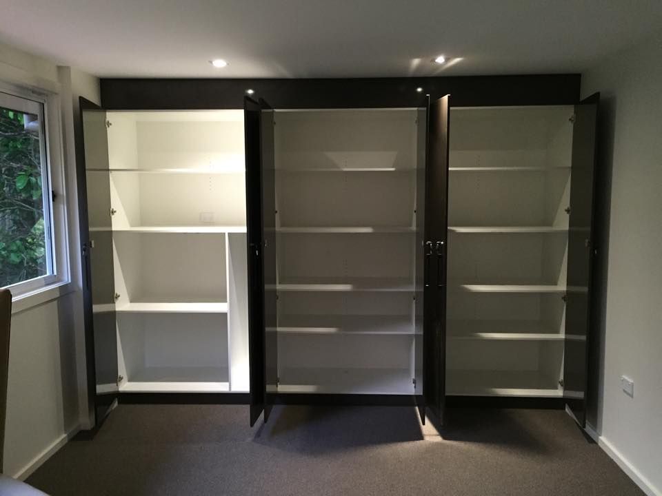 Three Dark Gray Cabinets with Open Doors — Platinum Kitchens & Bathrooms in Grafton, NSW