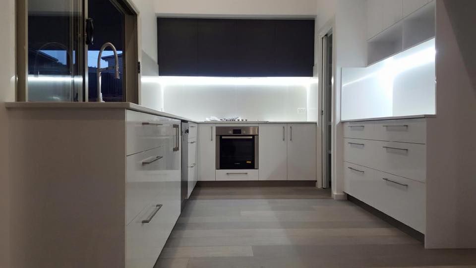 Modern Kitchen with White Cabinetry — Platinum Kitchens & Bathrooms in Sawtell, NSW