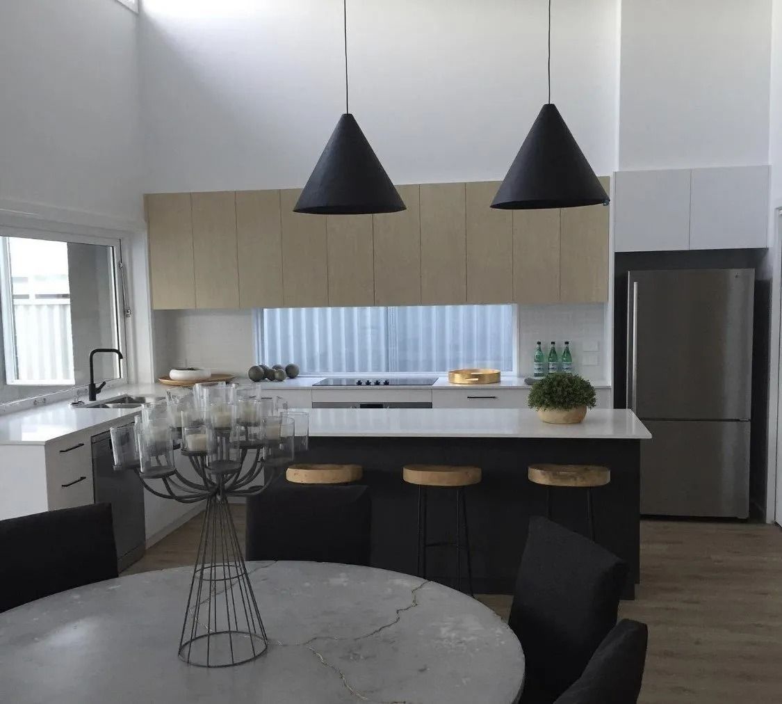 Modern Kitchen with Black Pendant Lights — Platinum Kitchens & Bathrooms in North Boambee Valley, NSW