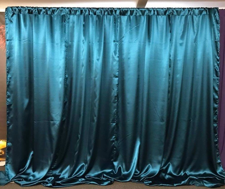 Turquoise satin wall drapes