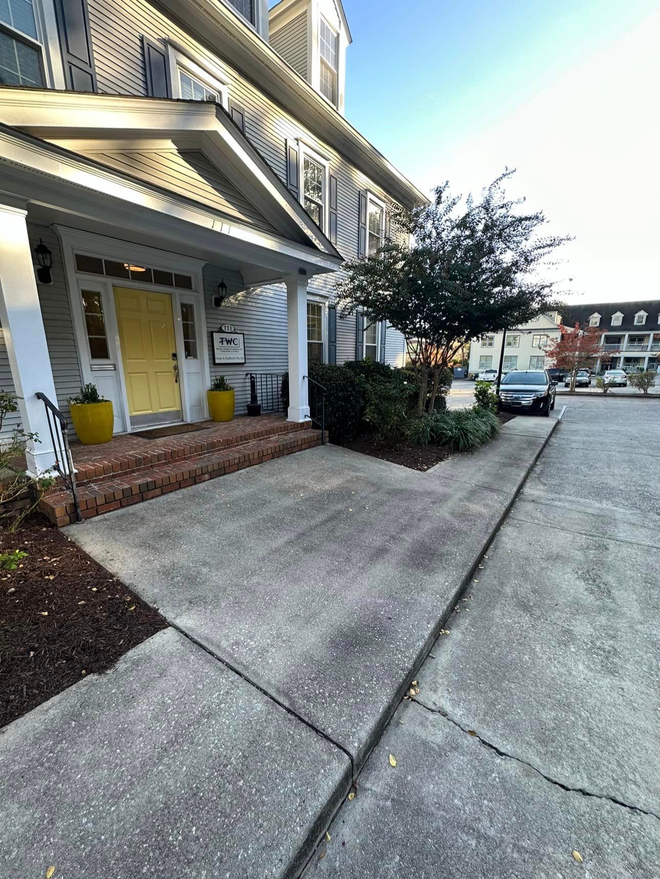 A Large White House With A Yellow Door - Lexington, SC - Big Wave Softwash