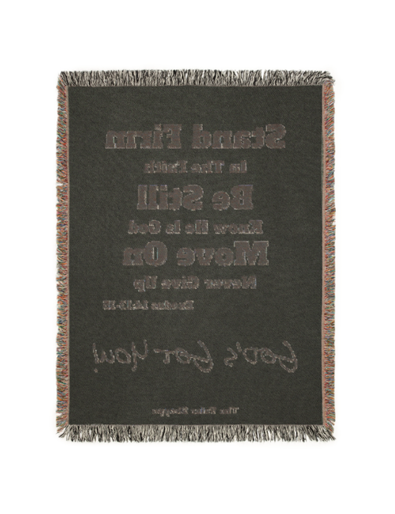 Tan blanket with inspirational text: 