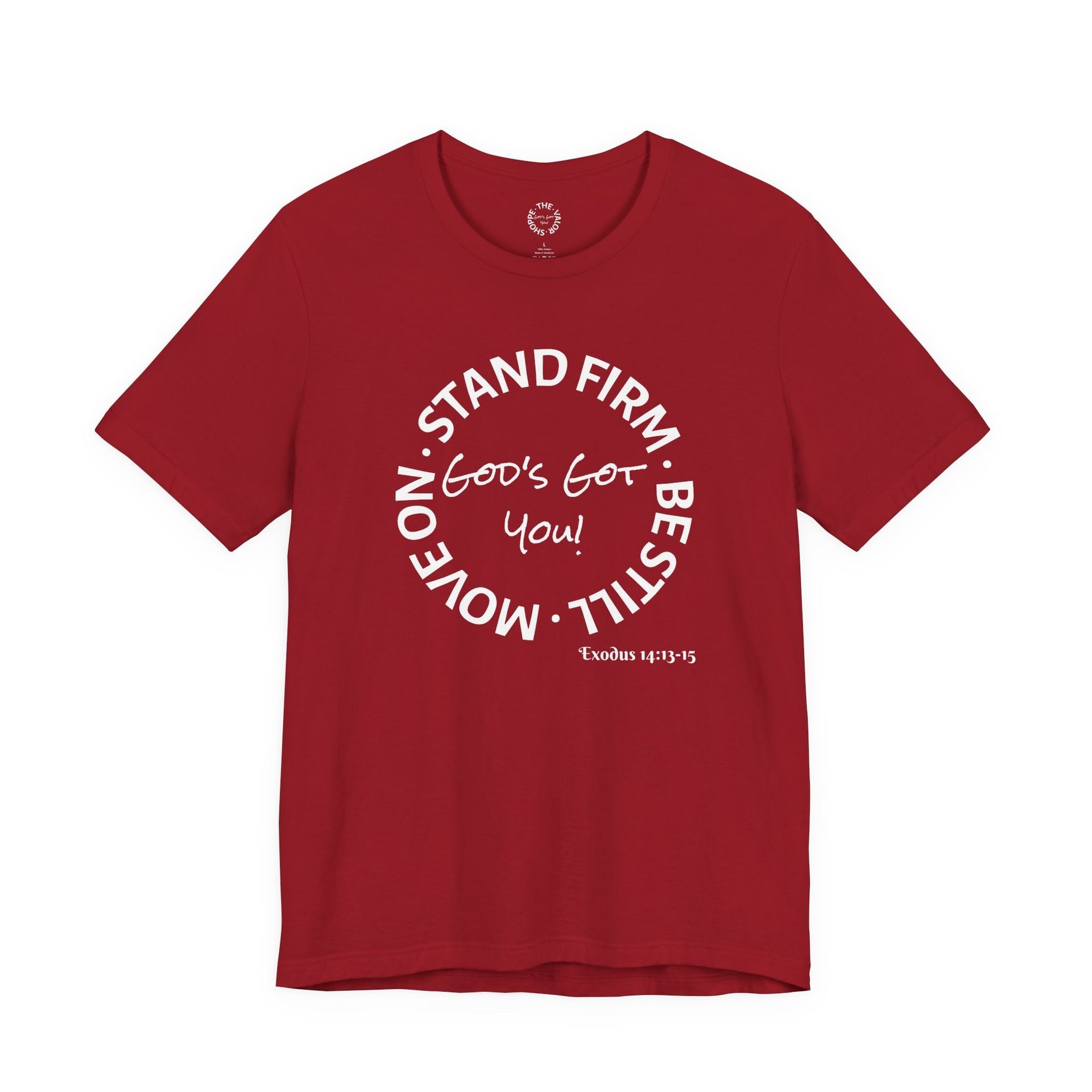 Red t-shirt with white text in a circle: “STAND FIRM. BE STILL. MOVE ON. God's Got You!” and a Bible verse reference.