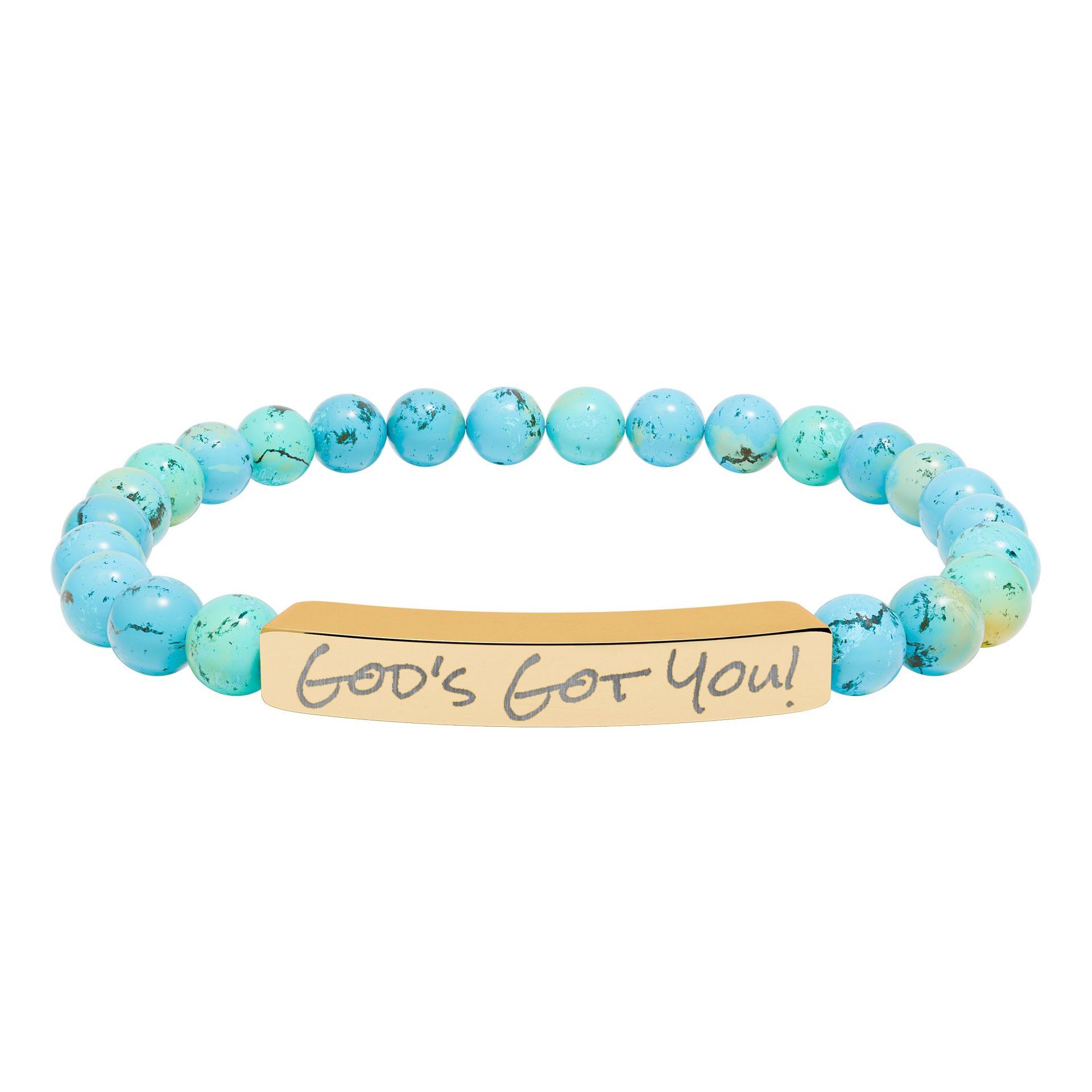 Blue beaded bracelet with gold bar inscribed 