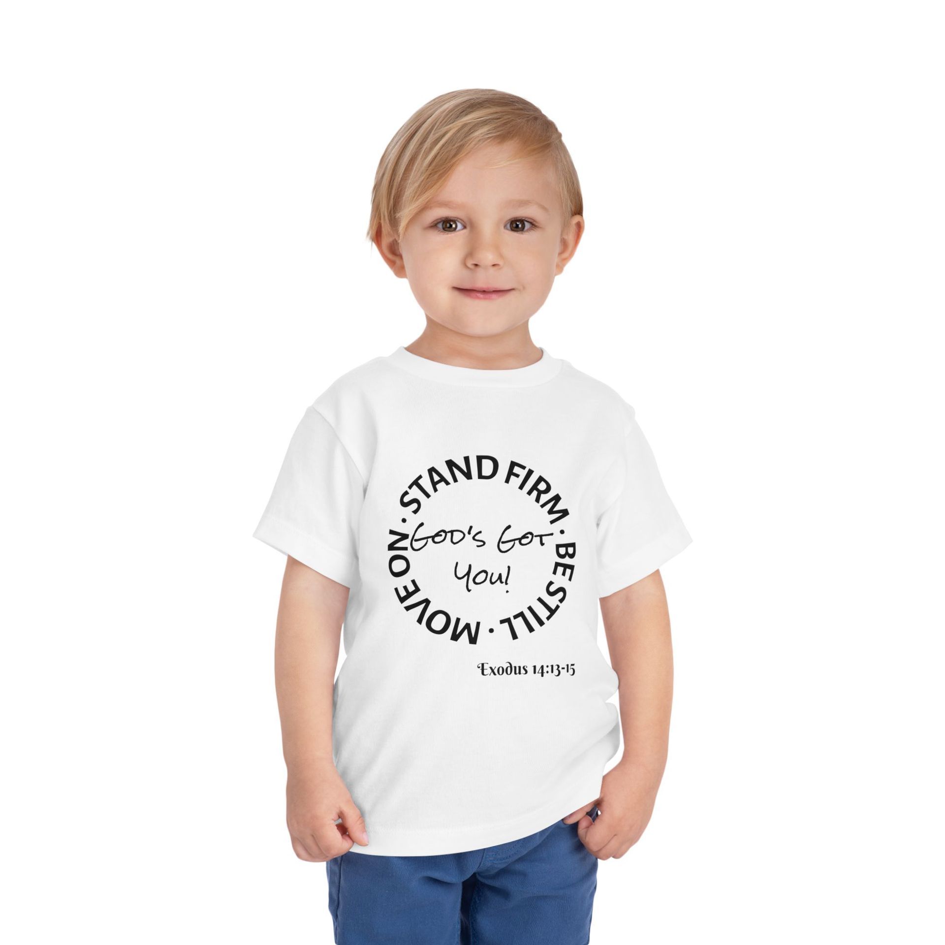 Young child wearing a white t-shirt with a "Stand Firm, Be Still, Move On" design.
