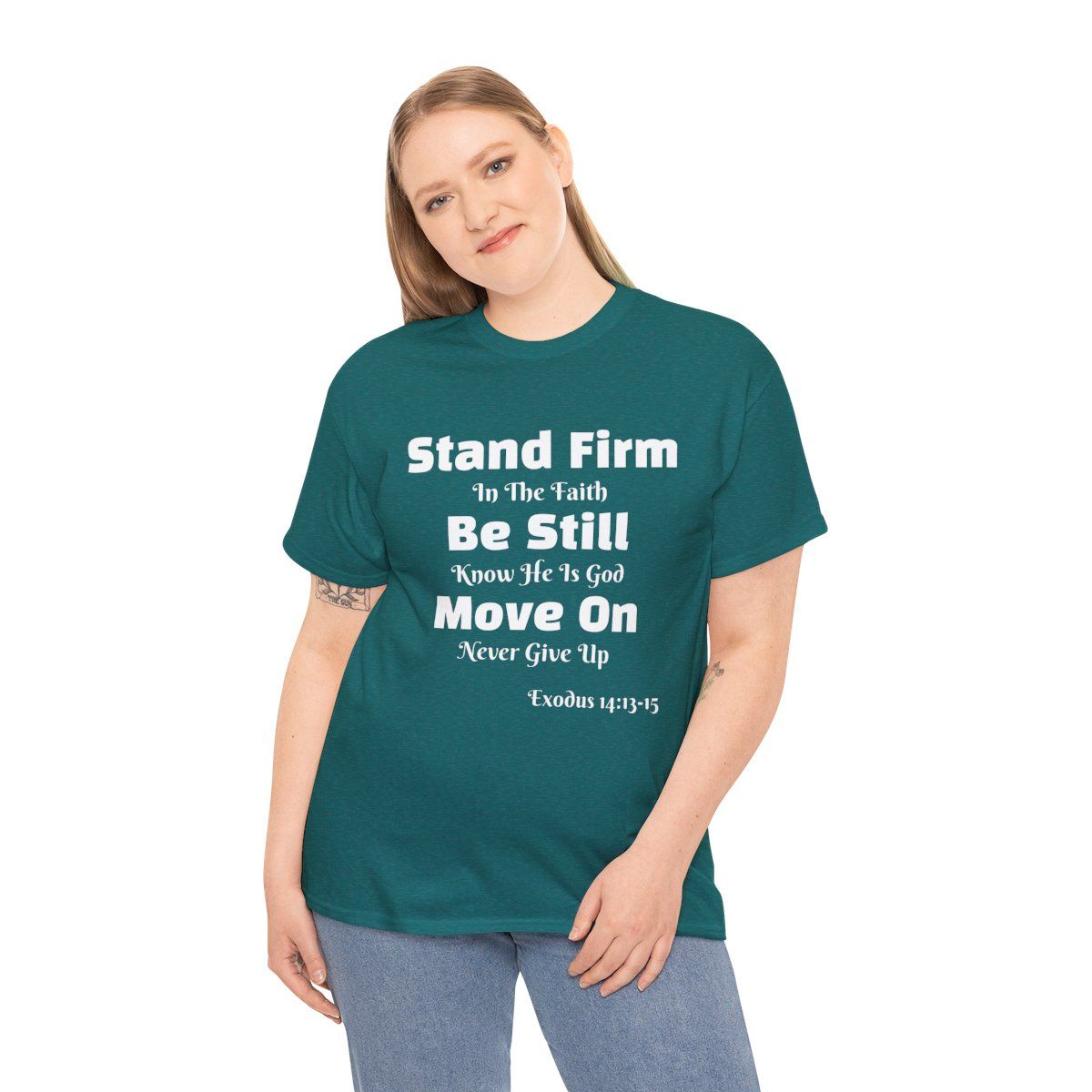 Woman wearing a teal t-shirt with inspirational text.