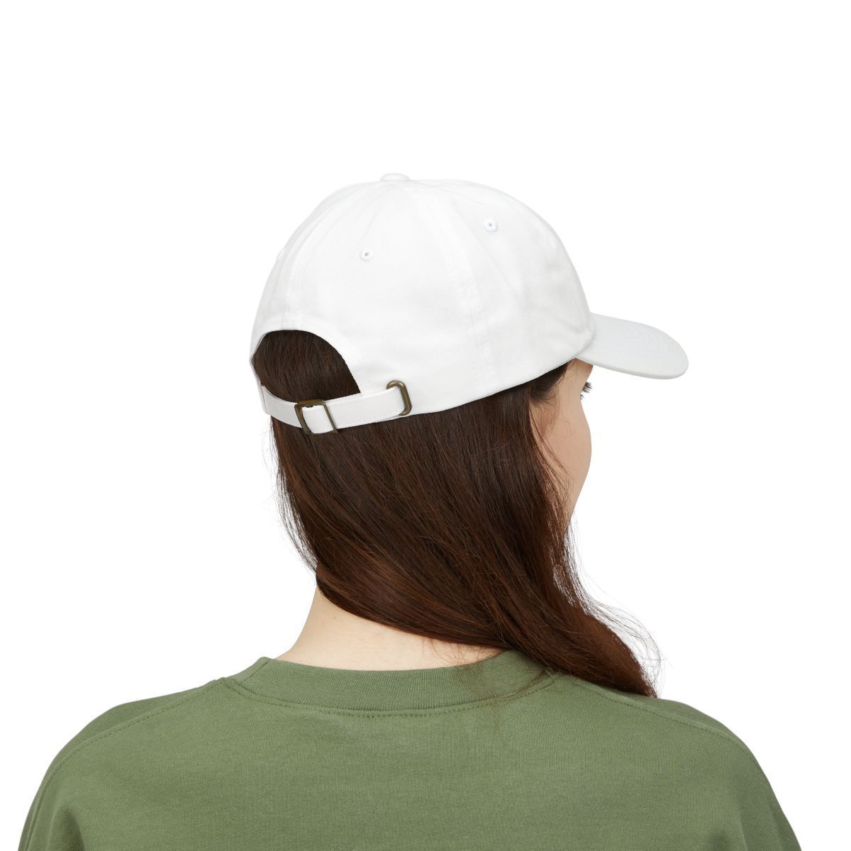 Woman wearing a white baseball cap, seen from the back. She's wearing a green shirt.