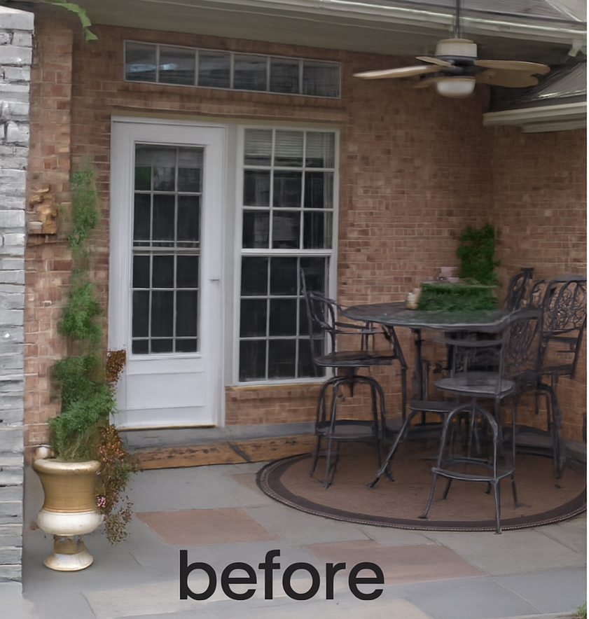 Brick patio with metal furniture, a door and a window.