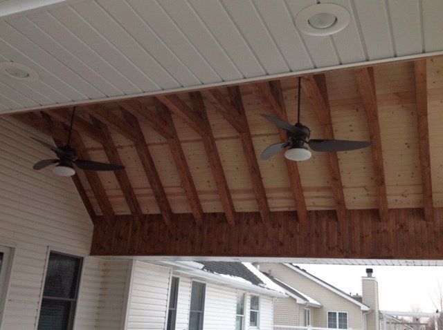 A ceiling fan is hanging from the ceiling of a house