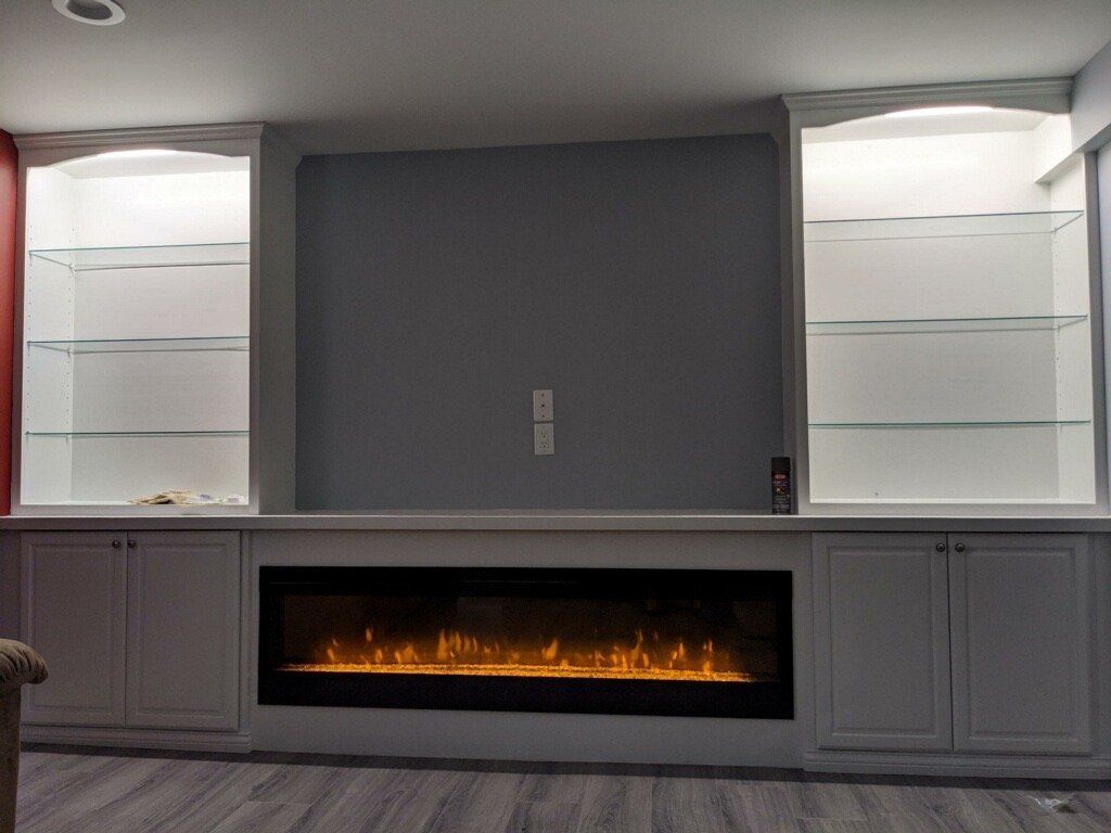 There is a fireplace in the middle of the room.