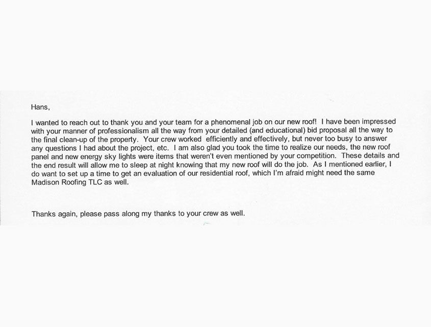 A handwritten thank you letter with text about a new roof, signed