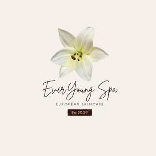 Logo: White lily above 