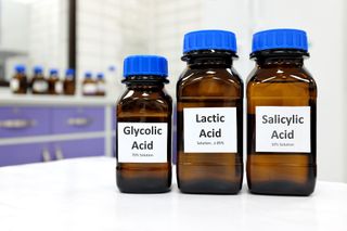 Three brown bottles labeled 