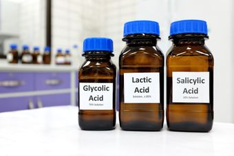 Three brown glass bottles labeled 
