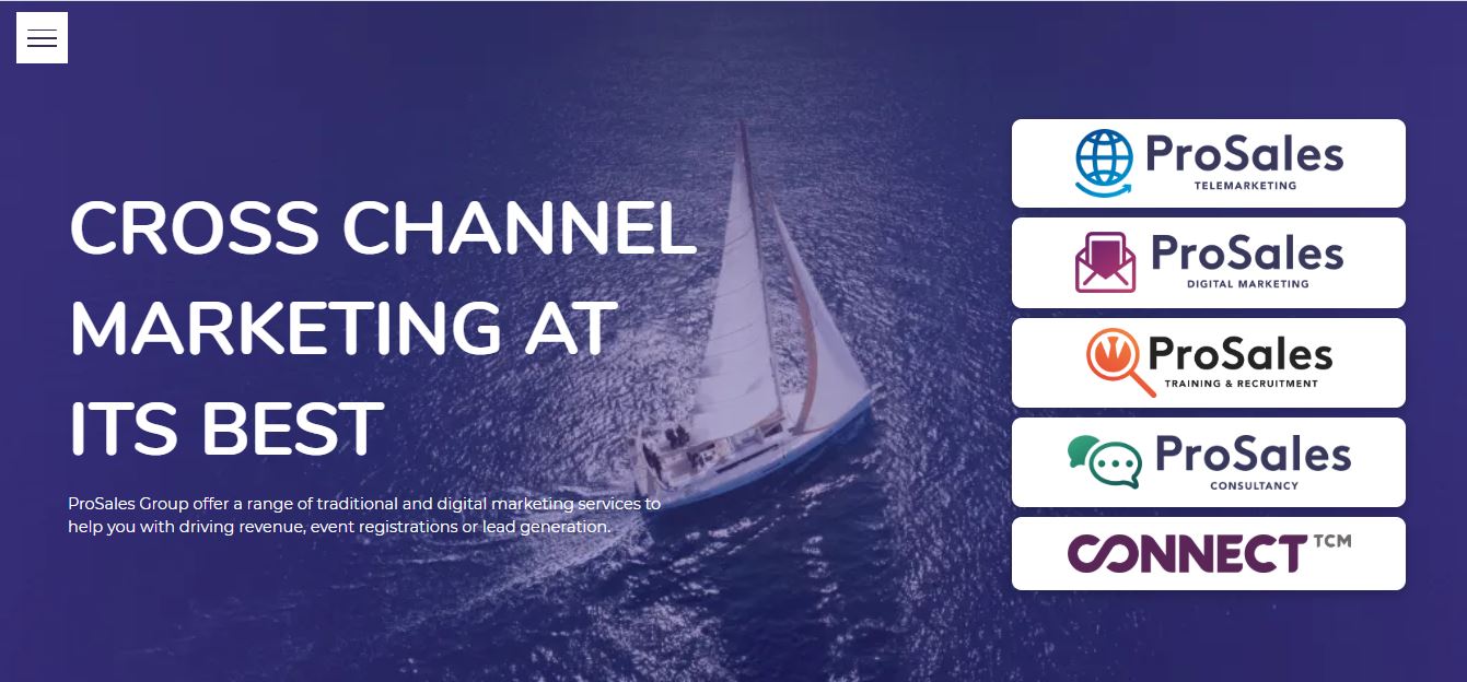 A sailboat is floating on top of a body of water.