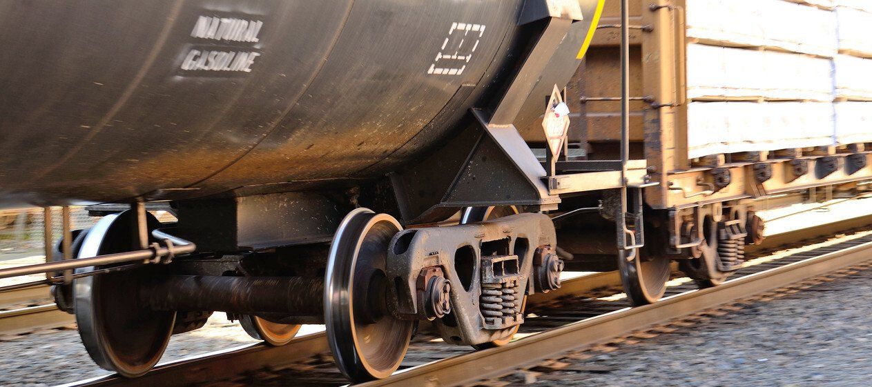 a photograph showing train wheels on tracks