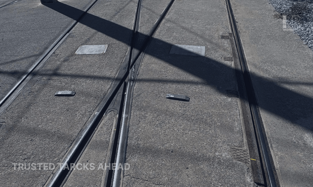 A railway balise is installed between rails.