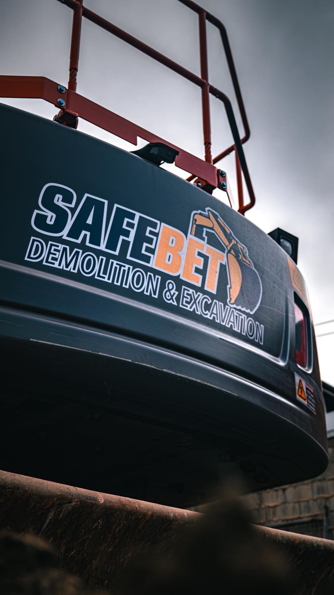 Dark blue excavator with 