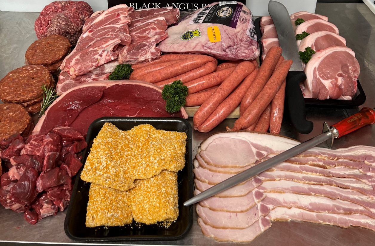 Assortment of Raw Meats Including Burgers, Chops, Steaks, Sausages, Bacon, and Schnitzel — Coastal Meats in Yeppoon, QLD