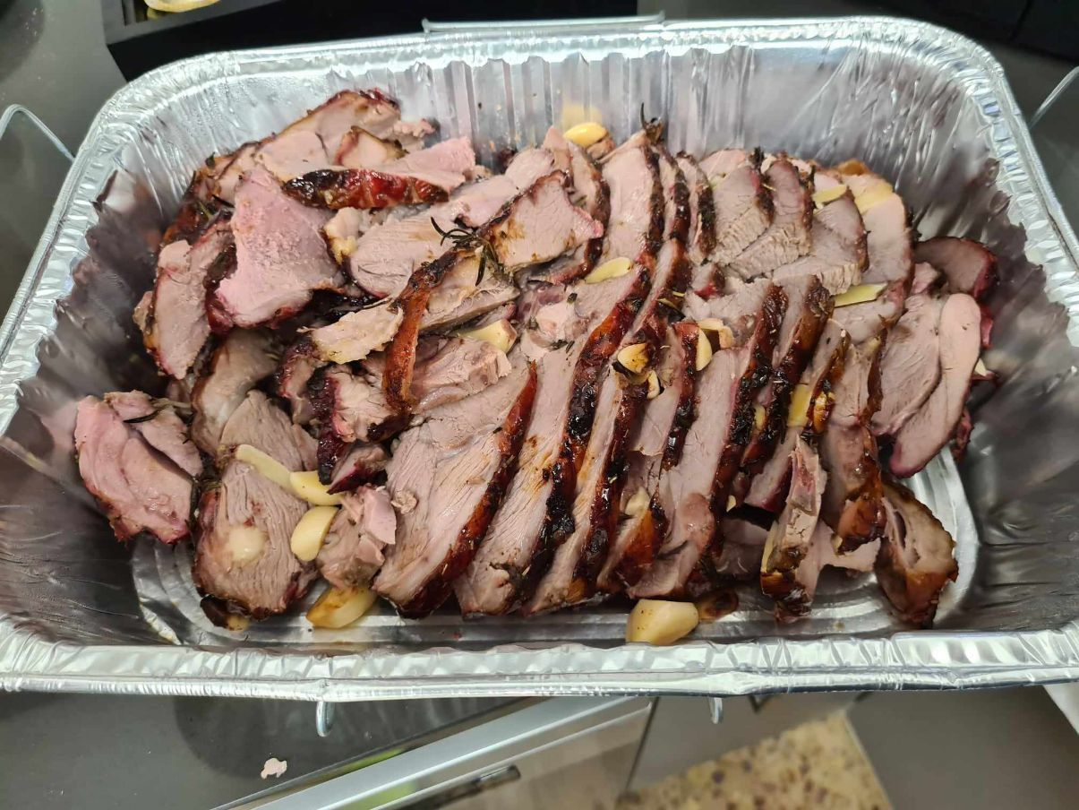 Aluminum Foil Container Filled With Sliced Meat and Garlic — Coastal Meats in Yeppoon, QLD