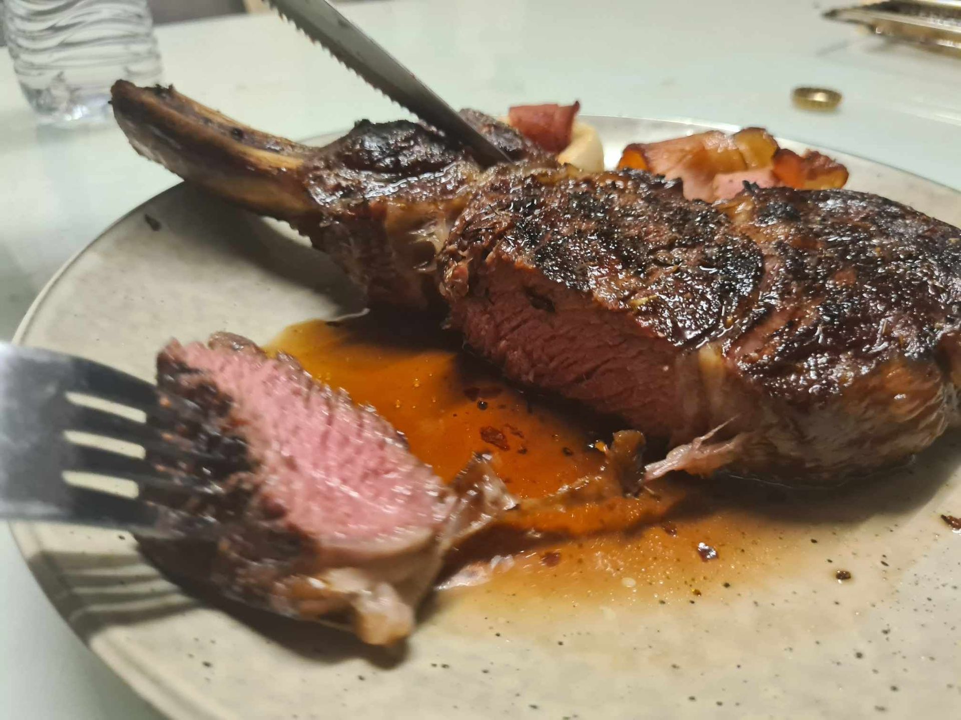 A Piece of Meat is Being Eaten with a Fork — Coastal Meats in Yeppoon, QLD