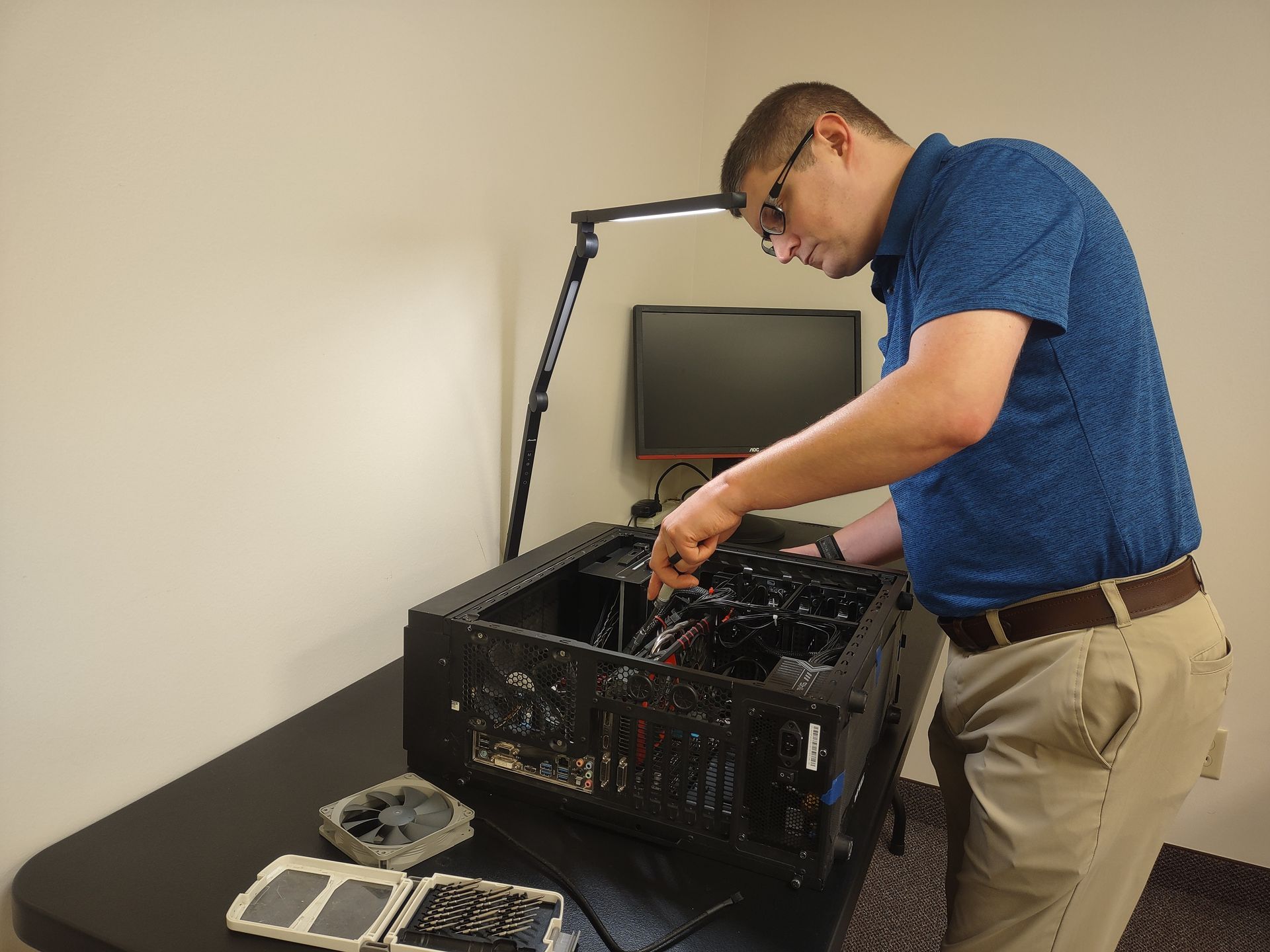 Expert repairing a system unit