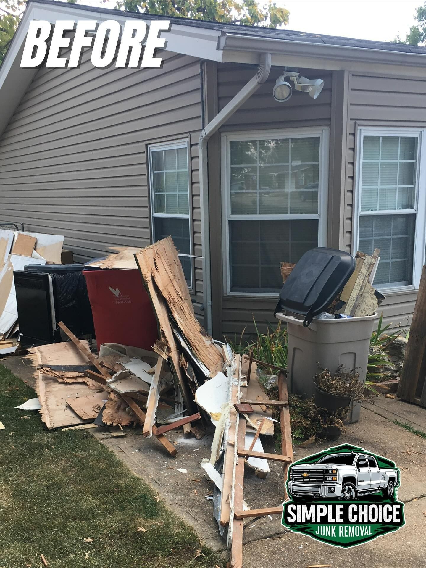 Exterior before shot of a house with piles of debris and trash. The house has beige siding and white-framed windows.