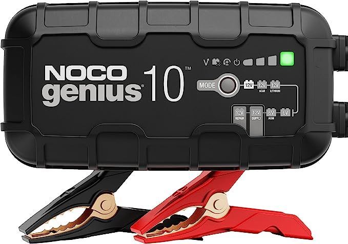 A noco genius 10 battery charger with red and black clamps