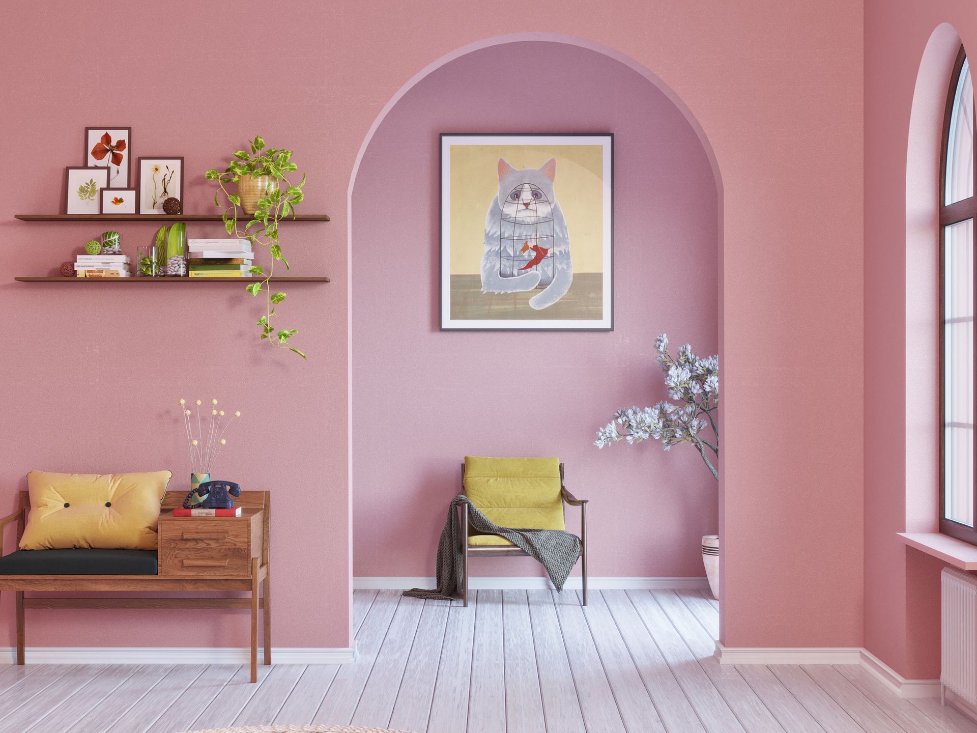 A living room with pink walls and a picture of a cat on the wall.