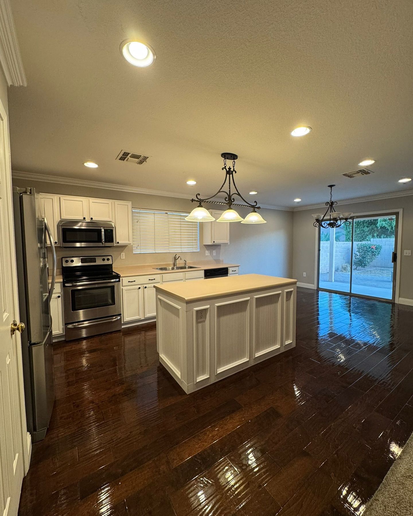A kitchen with a large island in the middle of it