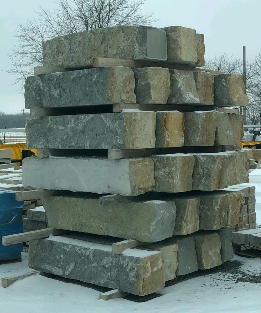 rough cuts construction out of Harrison, Arkansas building a retaining wall with stone for sale