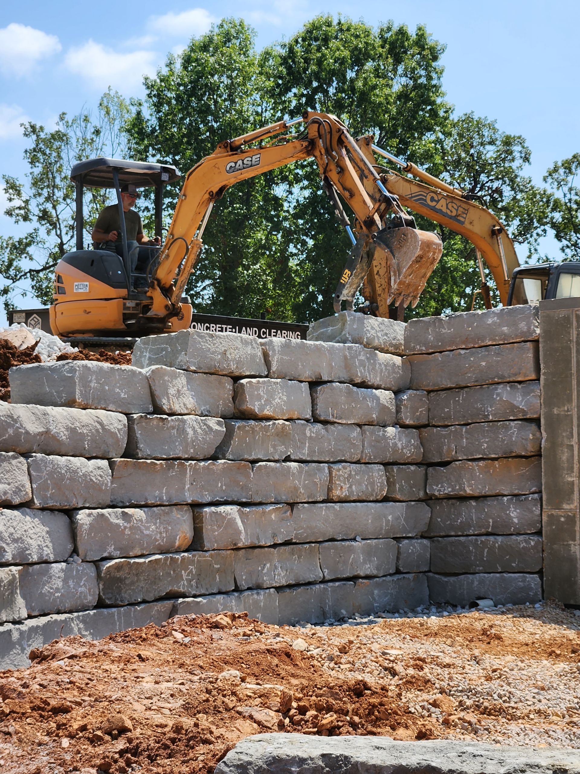 rough cuts construction out of Harrison, Arkansas with a retaining wall they built