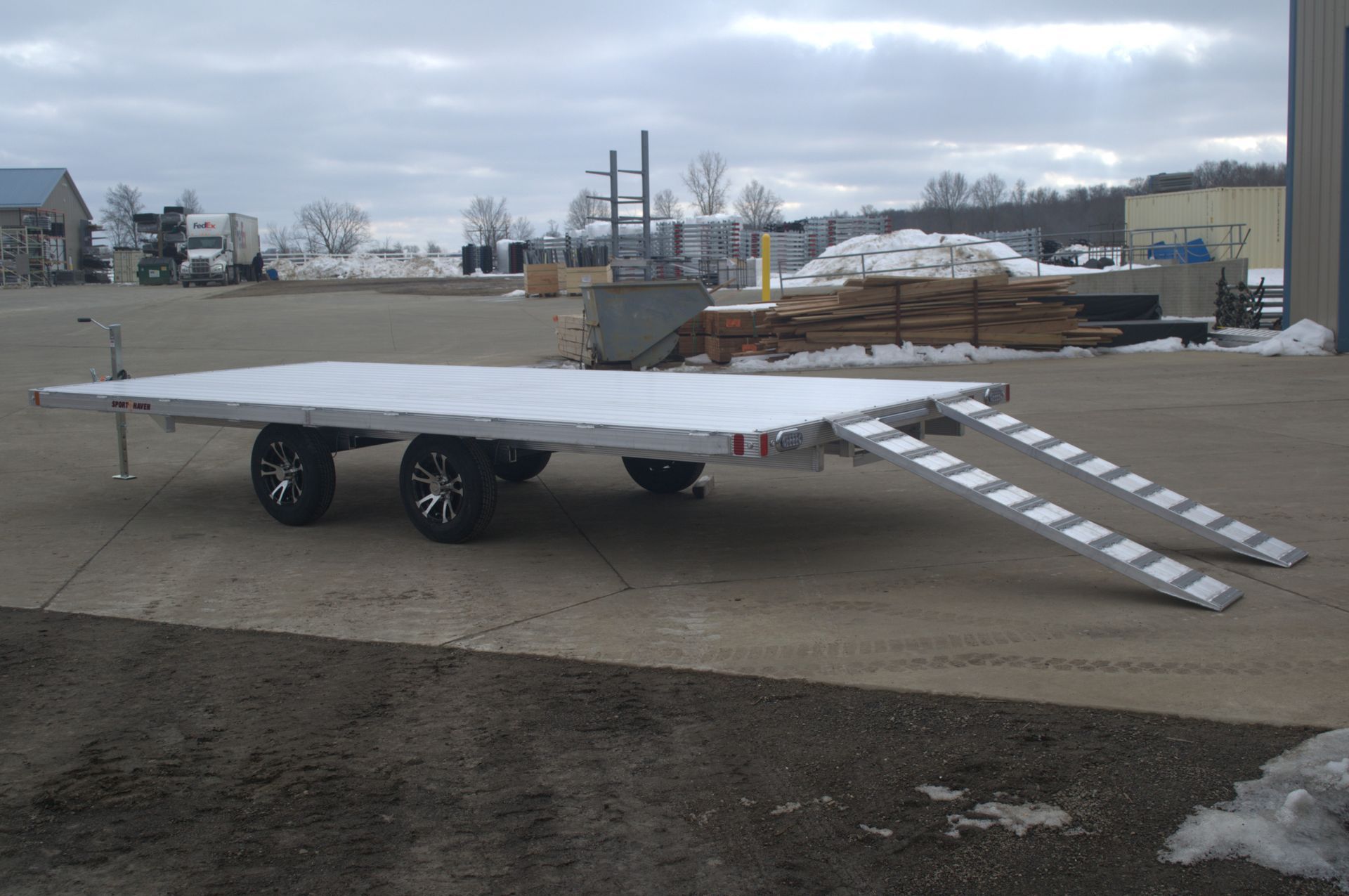 Aluminum Deck over sport haven trailer with rear ramps